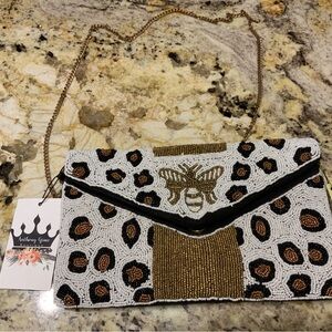 Jane MarieWhite and Gold Beaded Clutch